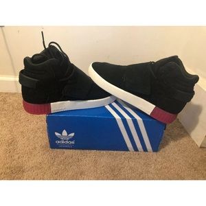 Woman’s Adidas originals tubular  strap sneakers